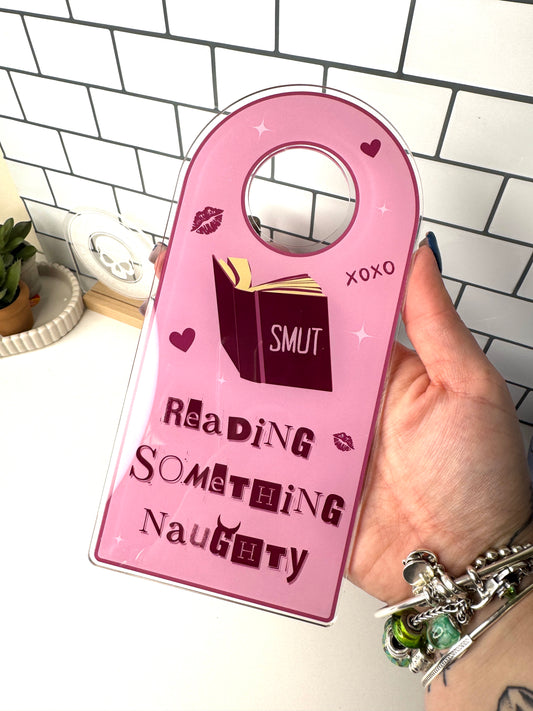 Reading Something Naughty Door Hanger